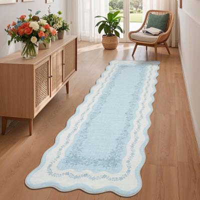 Garvee Surrounding Floral Border Scalloped Area Rug