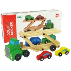 Grüner Holzlastwagen mit Lastwagenblöcken