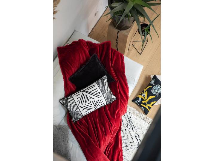 Plaid uni en coton rubis 135 x 200 cm