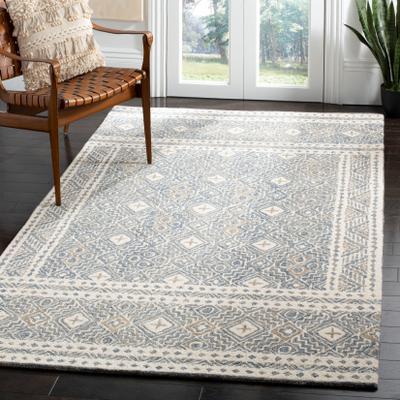 SAFAVIEH Handmade Micro-Loop Jelske Wool Rug