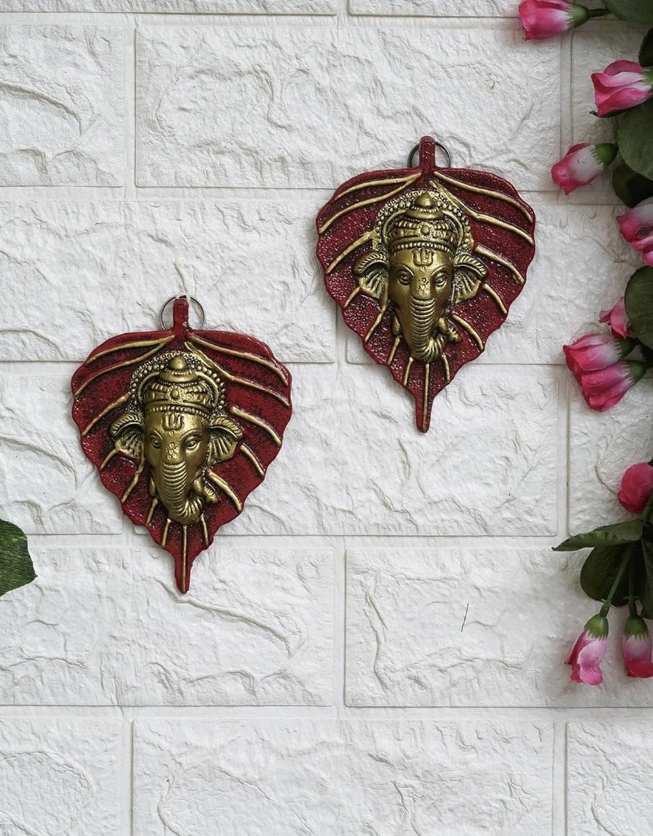 Wanddecoratie Lord Ganesha gezicht op blad in rood en goud