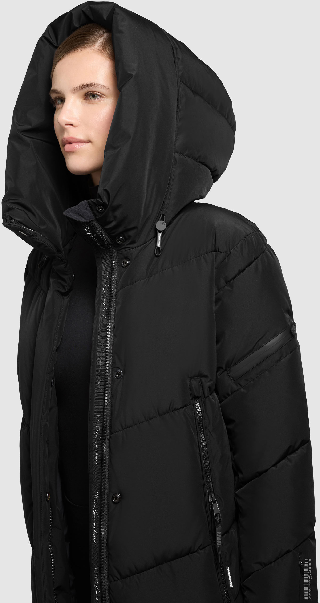Steppmantel KHUJO "PULSET2", Damen, Gr. XL, schwarz, Web, Obermaterial: 100% Polyester. Futter: 100% Nylon. Wattierung: 100% Polyester, unifarben, kniebedeckend, elastischer Bund, Mäntel Steppmantel, seitliche Schlitze mit Druckknöpfen schwarz XL
