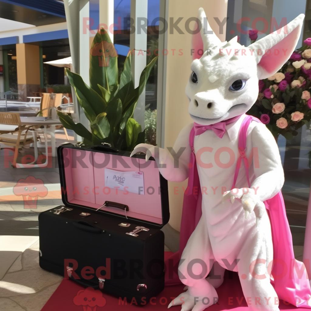 Maskottchenfigur REDBROKOLY eines rosa Chupacabra mit Brautkleid und Aktentasche