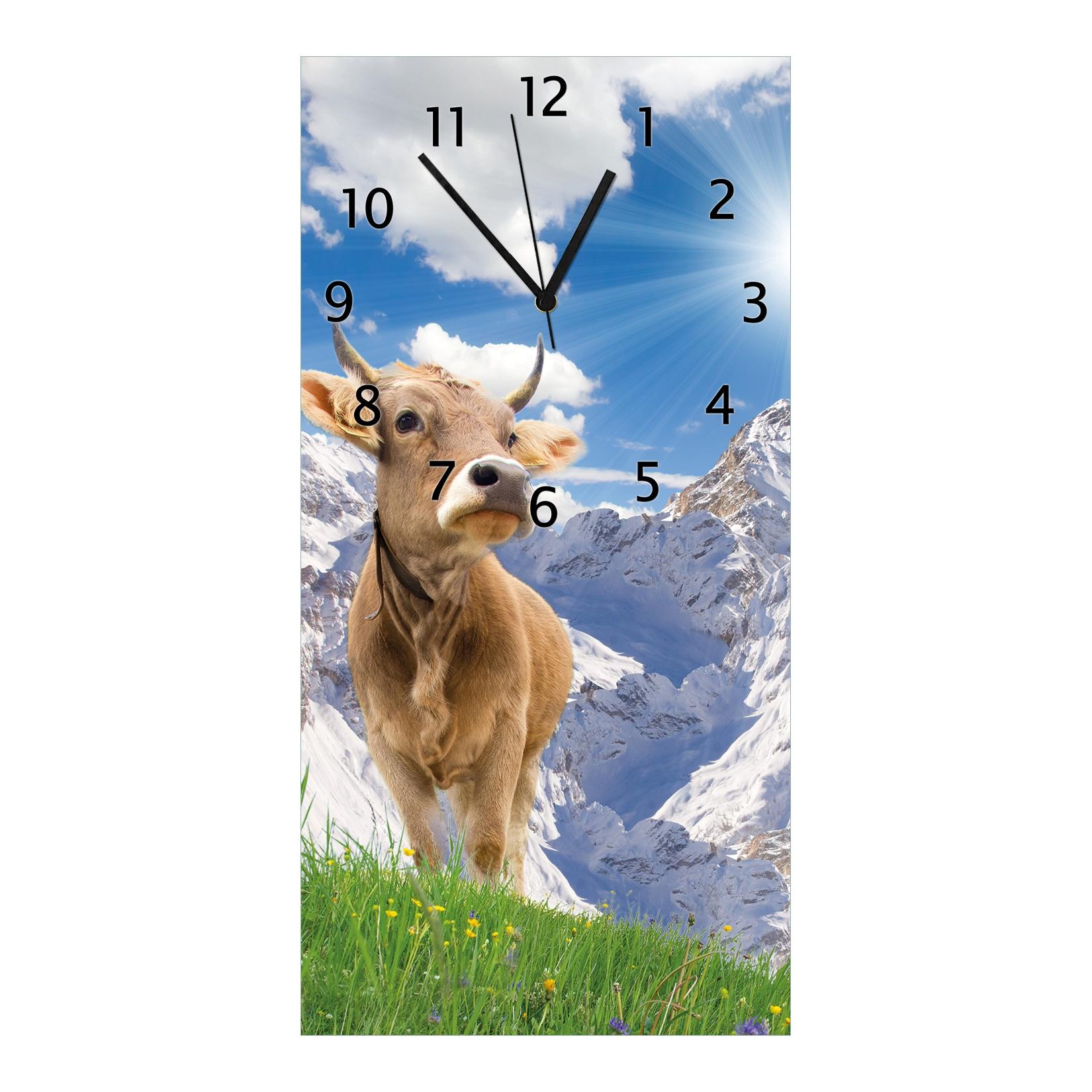 Wallario Uhr 30 x 60 cm, schwarze Zeiger Kuh im Sonnenschein in den Alpen