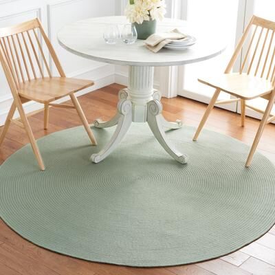 SAFAVIEH Handmade Braided Thanja Rug