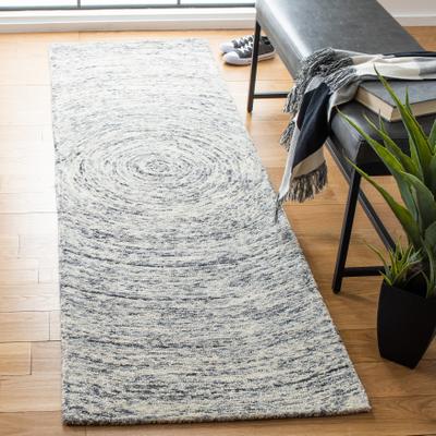 SAFAVIEH Handmade Ikat Jaycie Wool Rug