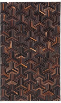 SAFAVIEH Handmade Studio Leather Lendite Modern Rug