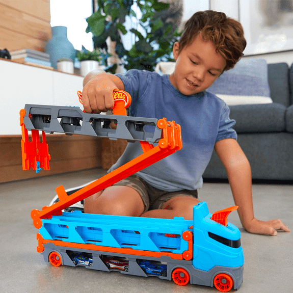 Hot Wheels City Speedway Hauler Racing And Storage Truck - Holds over 20 Hot Wheels cars, Unfolds into a 6-foot racetrack