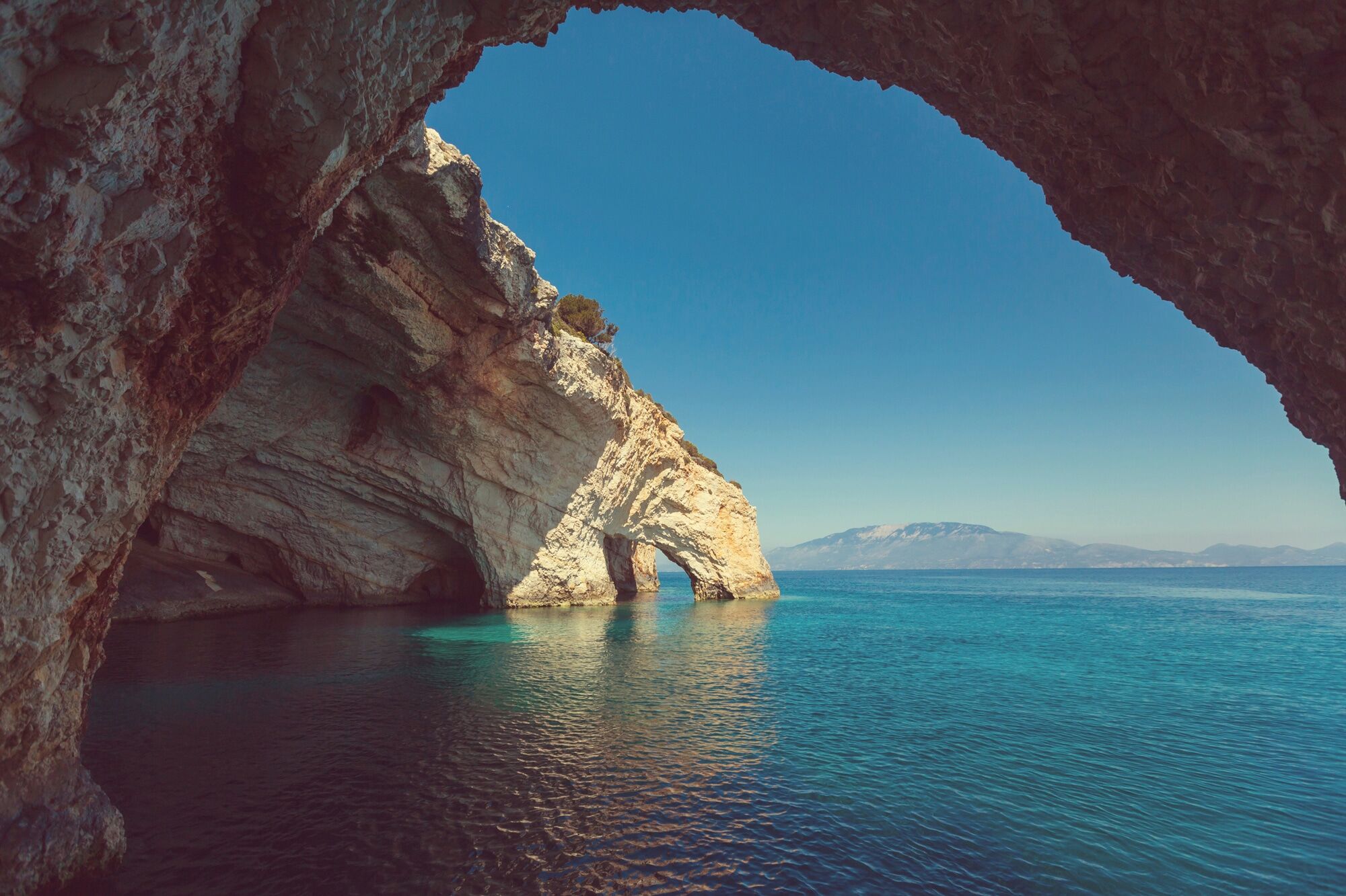 Fototapete PAPERMOON "GROTTE-ZAKYNTHOS INSEL MEER GRIECHENLAND FELSEN GEBIRGE", bunt, B:2m L:1,49m, Vlies, Tapeten, Fototapete