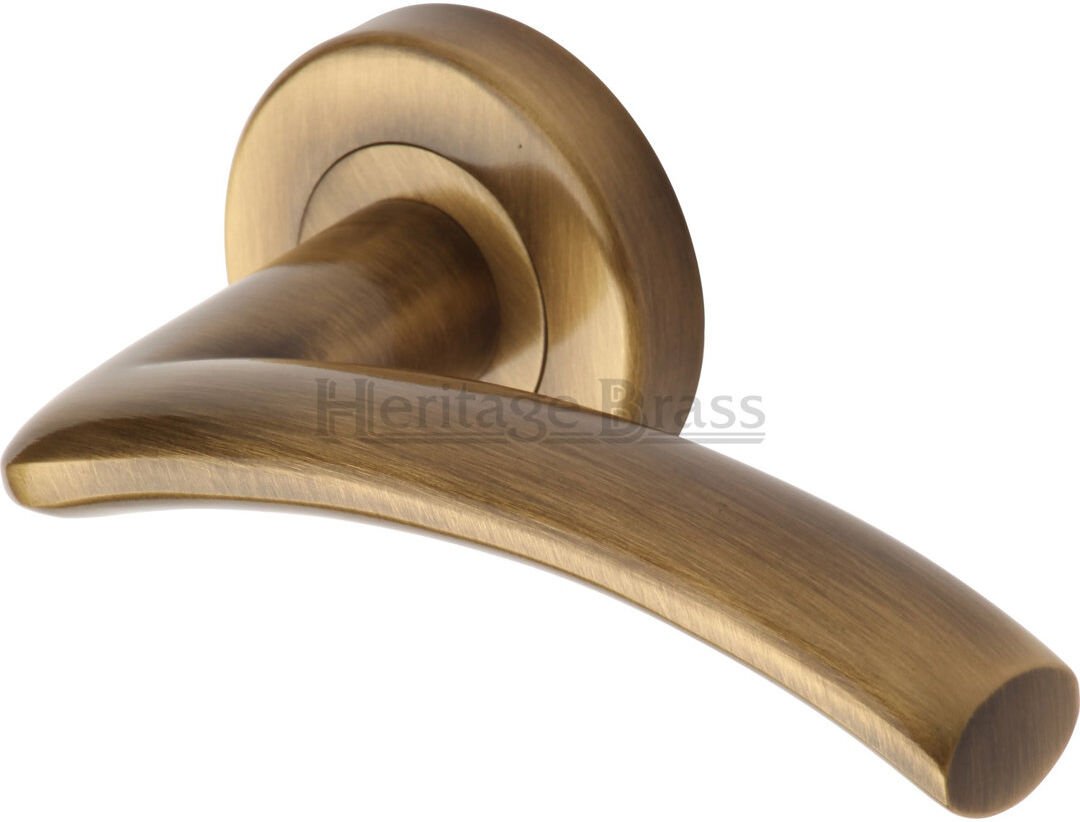 Heritage Brass Heritage Door Handle Lever Latch on Round Rose Centaur Design Antique Brass 5.3cm H X 5.3cm W