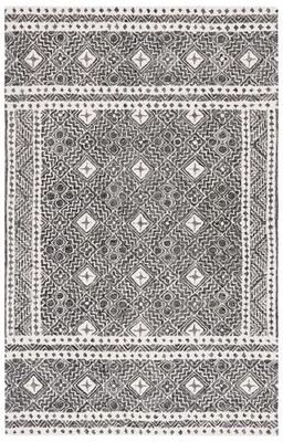 SAFAVIEH Handmade Micro-Loop Jelske Wool Rug