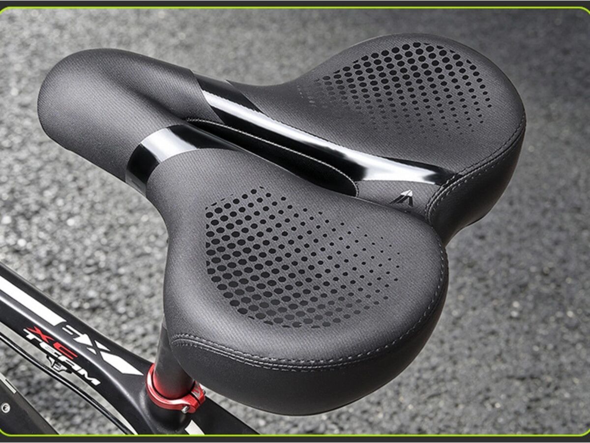 INF Petite selle de vélo large avec rembourrage épais, double absorption et cuir PU résistant à l'eau