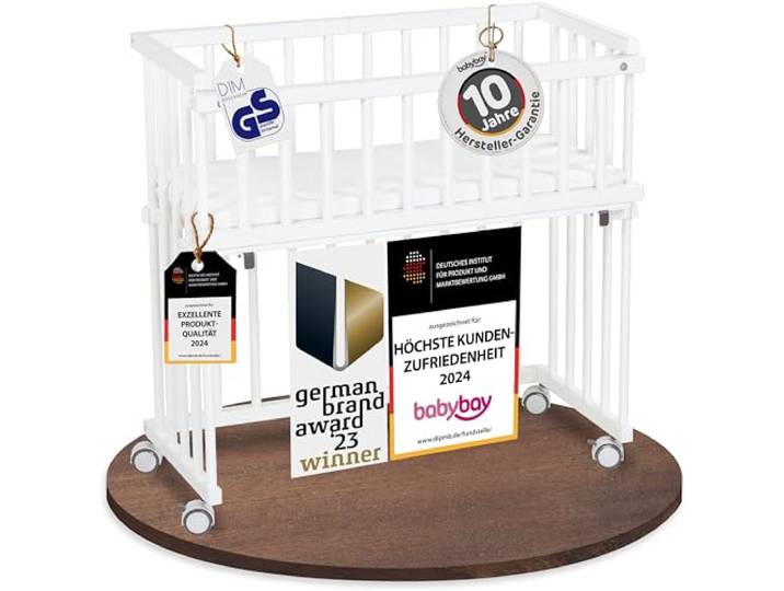 babybay Midi Beistellbett, weiß lackiert, mit Matratze, Gitter & Rollen Kompaktes Babybett, GS-geprüft, massive Buche, stufenlos höhenverstellbar, sicher am Elternbett befestigt & mitwachsend