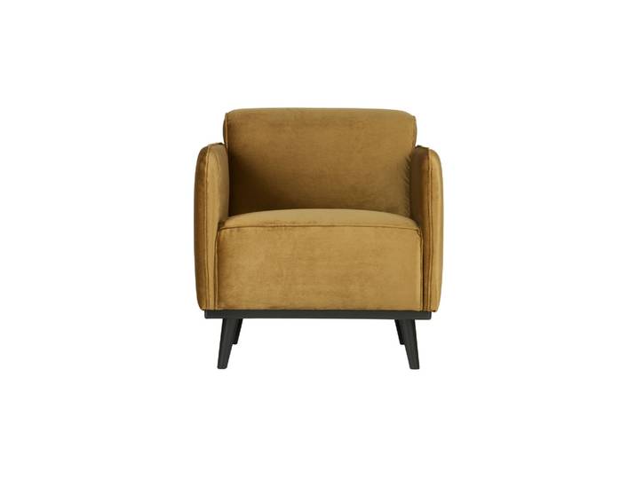Fauteuil en velours jaune miel Statement