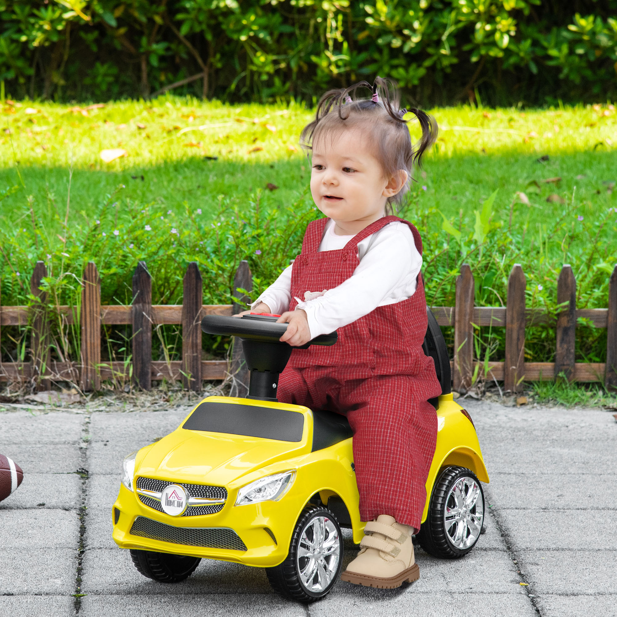 Homcom Macchina Cavalcabile Giocattolo per Bambini con Volante, Musiche e Fari, Età 18-36 Mesi, 63.5x28x36cm, Giallo Aosom