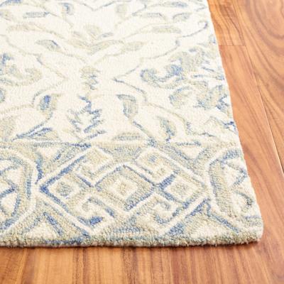 SAFAVIEH Handmade Dip Dye Nicki Floral Wool Rug