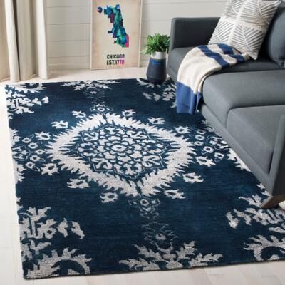 SAFAVIEH Hand-knotted Stone Wash Bengu Modern Wool Rug