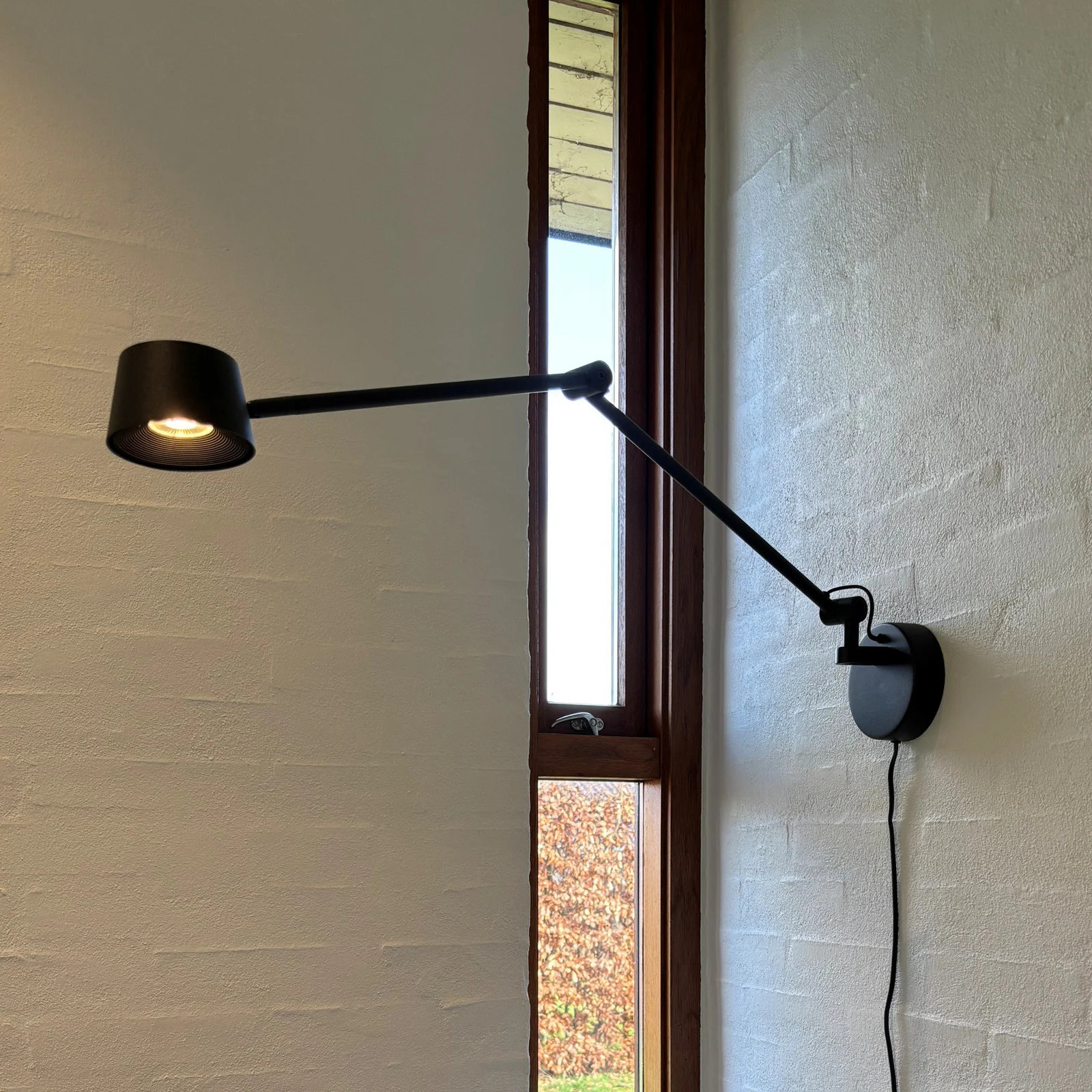 Antidark Direction LED wandlamp zwart metaal uitval 53 cm