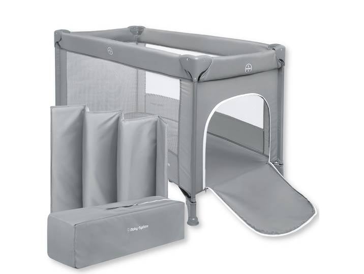 Lit de voyage pliable Moby-System Happy Traveller, modèle de base, avec matelas et sac de transport.