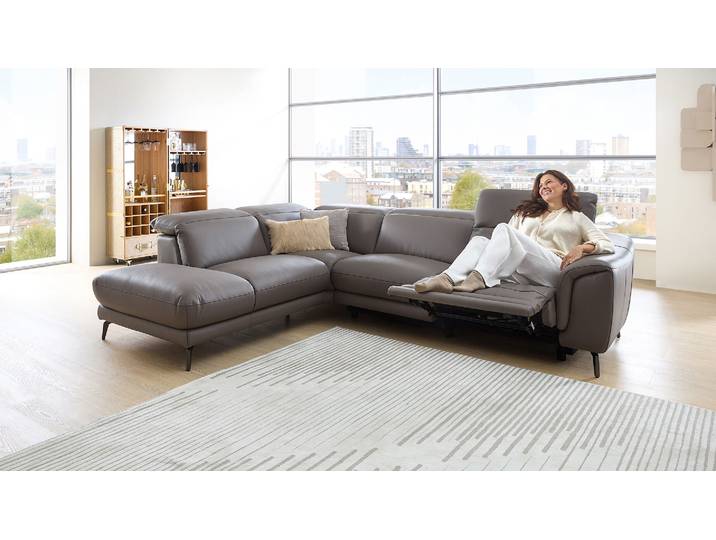 Leder Couch mit motor. Relaxfunktion und Kopfteilverstellung