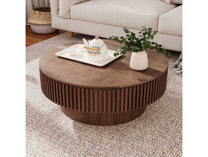 Table basse ronde noyer avec rangement intégré et design cannelé