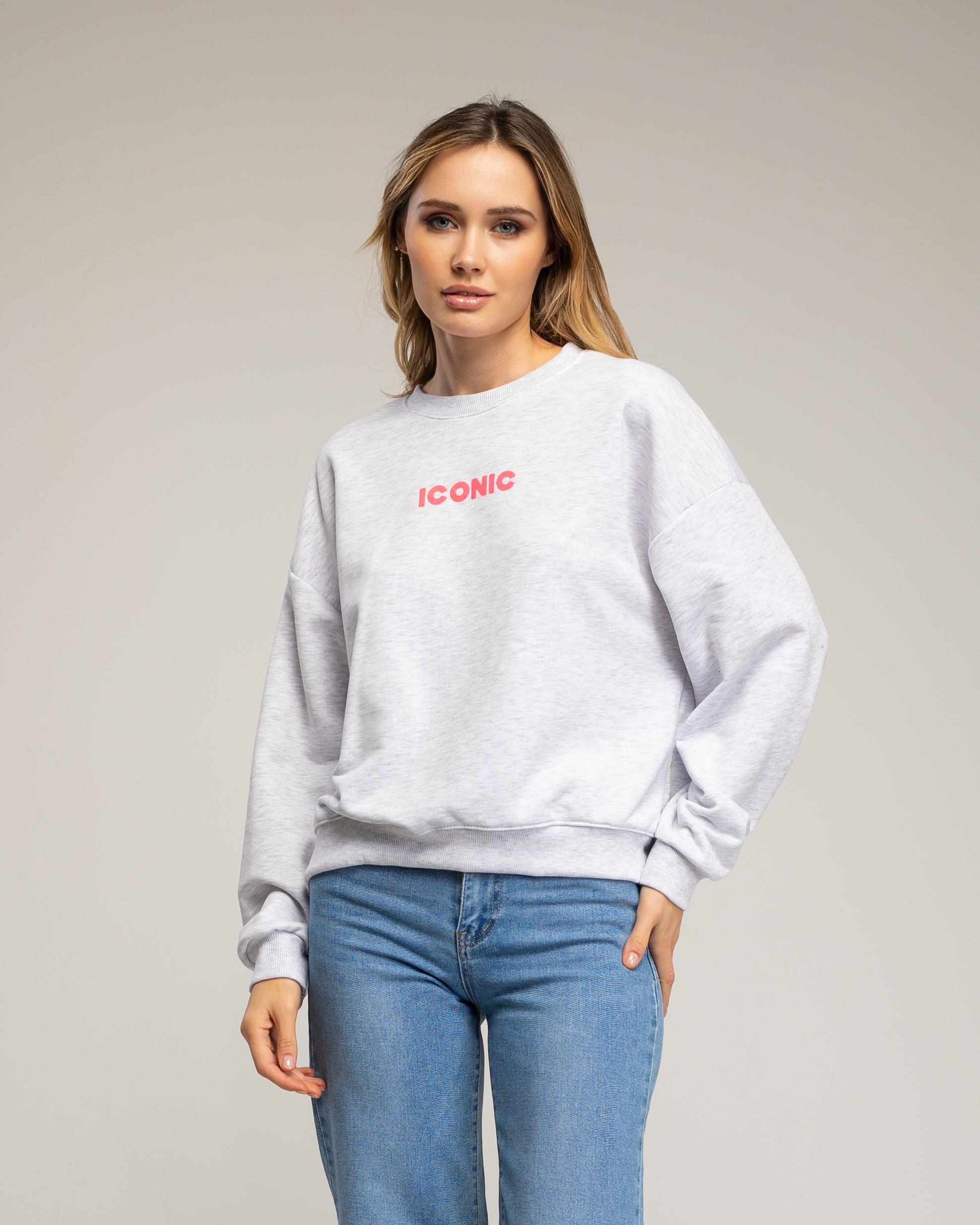Sweatshirt met de tekst 'iconic' in neonkleur op de voorkant en de rug.