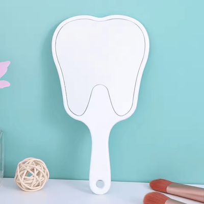 Inspire Curations Cute Tooth Shaped Handheld Makeup Mirror white