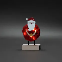 KONSTSMIDE LED Holzsilhouette "Santa" rot, 6H Timer, 6 warmweiße Dioden, Innen, Batterie: 2 x AA 1,5V (exkl.)