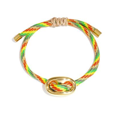 Freundschaftsarmband ADELIA´S "Armband Freundschaftsarmband geflochten mit ovalem Knopfdetail", pink (mehrfarbig), Armbänder, Damen, Edelstahl, Trendig mit geflochtenem Band und ovalem Detail