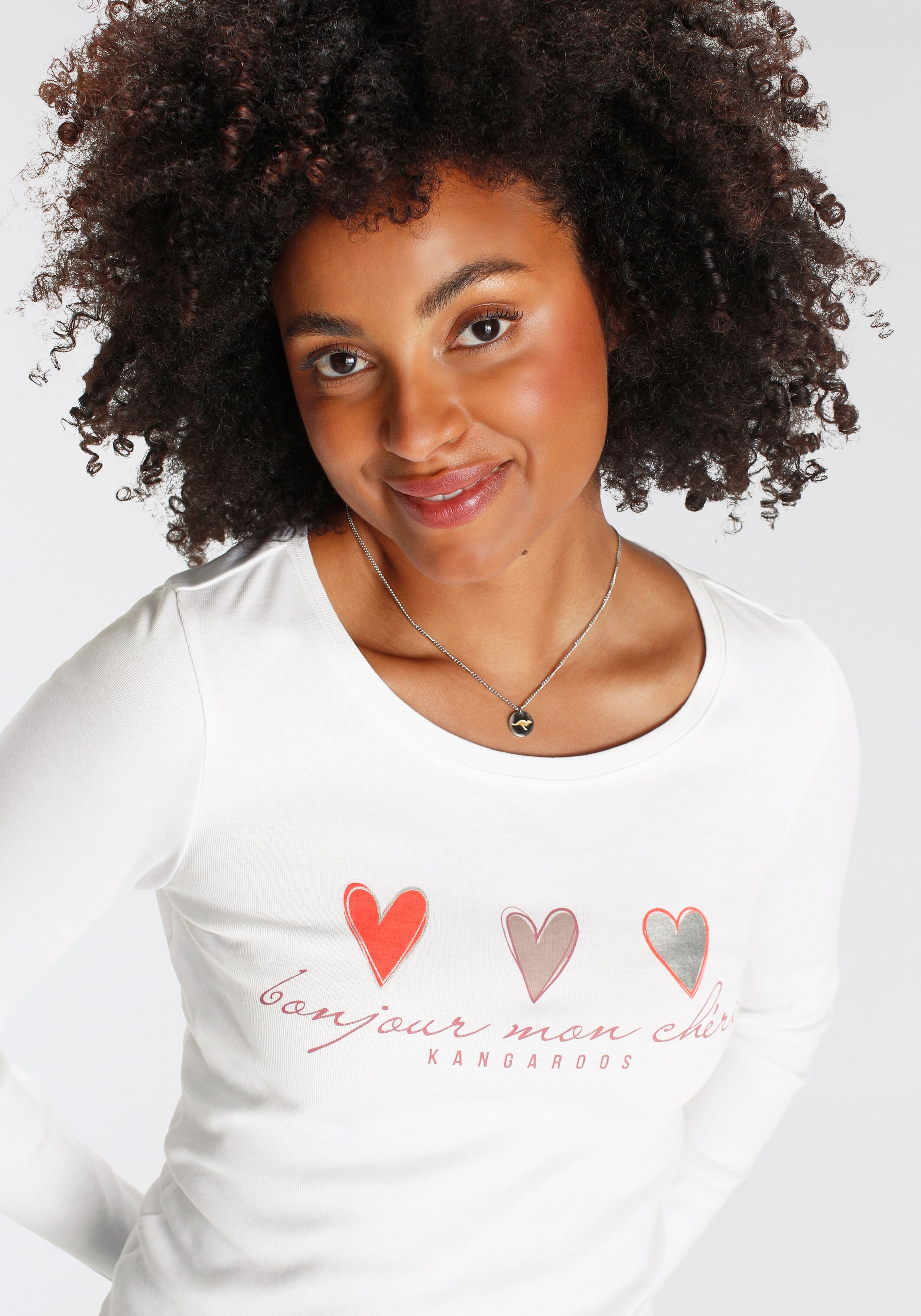 Longsleeve KANGAROOS, Damen, Gr. 44/46, weiss (weiß), Rippware, Obermaterial: 100% Baumwolle, bedruckt, unifarben mit Farbeinsatz, sehr figurbetont hüftbedeckend, Rundhals, Shirts Longsleeve, Langarm, sehr figurbetont und hüftbedeckend, mit Herzchen-Detai