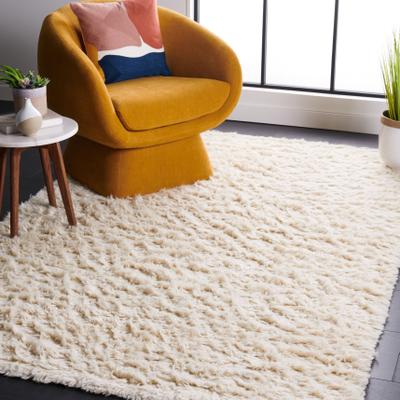 SAFAVIEH Handmade Flokati Tonda Shag Solid Wool Rug