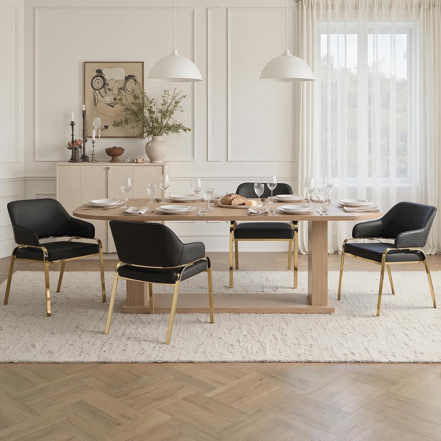 Set van 4 zwarte PU lederen eetkamerstoelen met opengewerkte rugleuning en gouden metalen poten