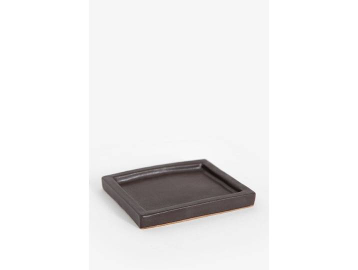 Donkerbruin glazed aardewerk schaaltje