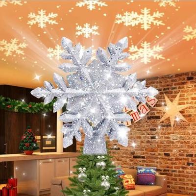 Inspired Finds Rotating Snowflake LED Christmas Tree Topper 3D Projector Light Rotating Snowflake LED Christmas Tree Topper 3D Projector Light