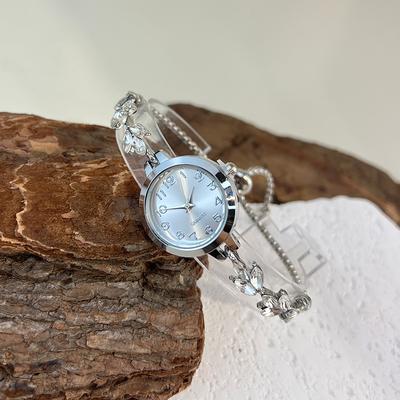 Combo Retail Shop Elegant Ladies Quartz Watch, Round Alloy Case, Arabic Numeral Dial, Leaf Shaped Diamond Studded Bracelet silver