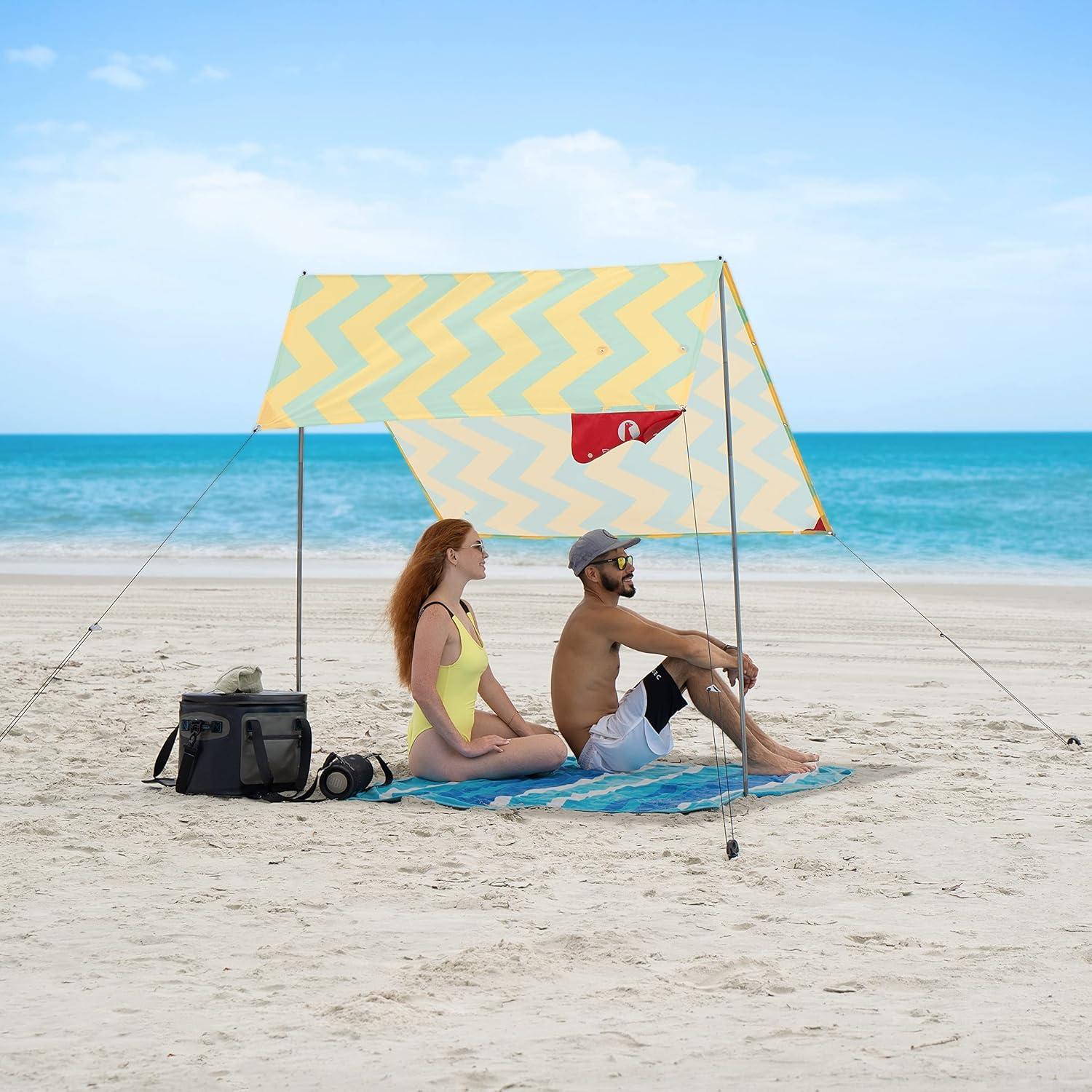 Strandtelt von Teepee de Red Suricata für 1 bis 2 Personen, mit UV-Schutz UPF50, bestehend aus einem Zelt mit 2 Aluminiumstangen und einem Querstab, sowie 4 robusten Ankern