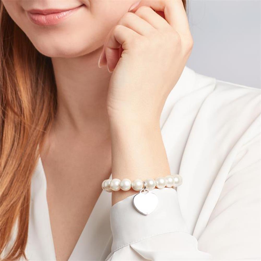Unique Perlenarmband mit Herzanhänger weiß
