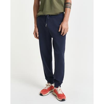 Sweathose GANT "REG SHIELD SWEATPANTS", Herren, Gr. XXL, N-Gr, blau (evening blau), Web, Obermaterial: 87% Baumwolle, 13% Polyester, unifarben, regular fit knöchellang, Hosen Sweathose, mit Logostickerei unterhalb des Bunds