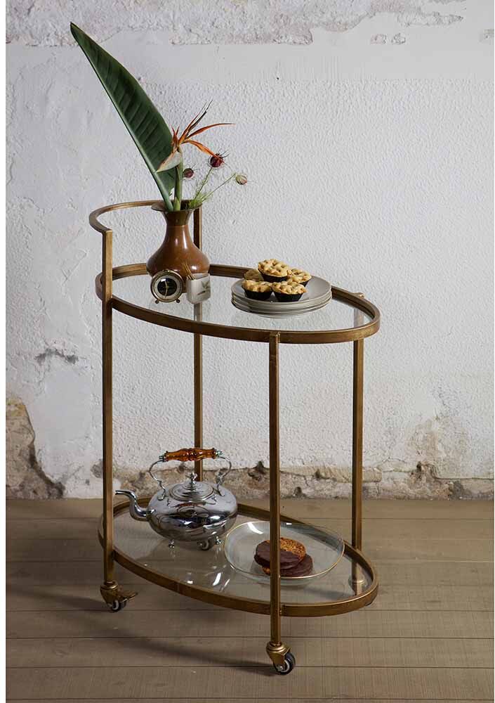 Pharao24.de Serviertisch in Messing oval Glasplatte