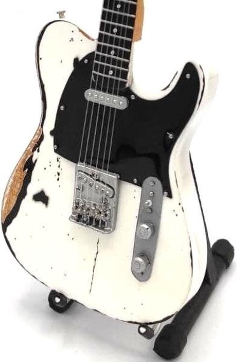 Miniatuur gitaar Rick Parfitt Status Quo voor op tafel