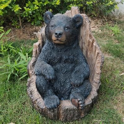 Hi-Line Gift Lone Cub Haven: Intriguing Black Polyresin Bear in Stump Figurine