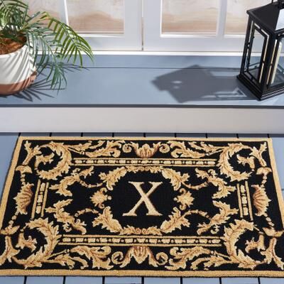 SAFAVIEH Handmade Monogram Berendine Casual Rug