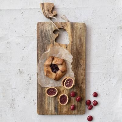 Storied Home Mango Wood Cheese and Cutting Board with Santa Hat Cut-Out
