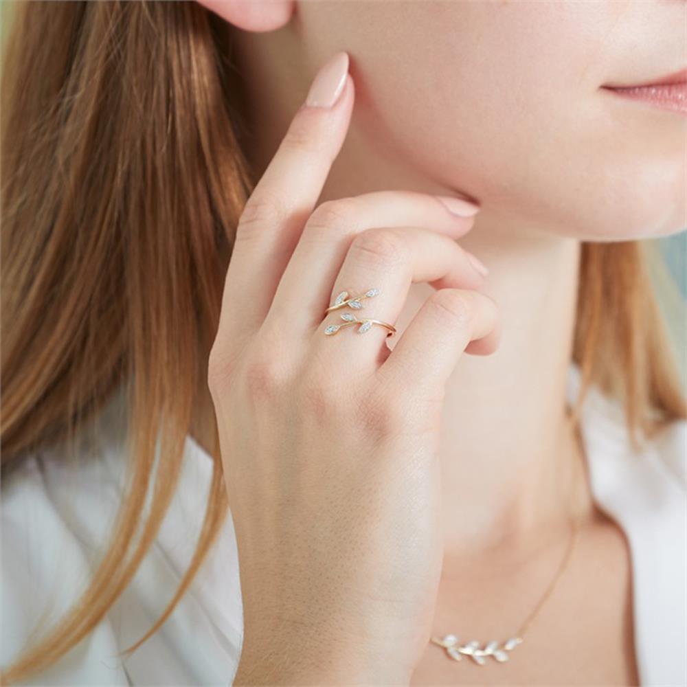 Unique 585er Goldring im Blattdesign mit Diamanten gold
