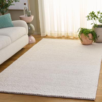 SAFAVIEH Handmade Natura Korlan Raised Textured Wool Blend Rug
