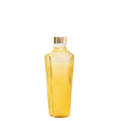 Zafferano Handliche Flasche aus goldgelbem Borosilikatglas mit vertikaler Rillenverzierung, elegantes und funktionales lineares Design, ideal für den Tisch