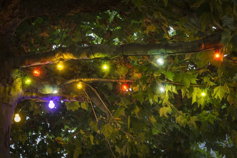 KONSTSMIDE LED-Lichterkette "Party-Lichterkette aussen", schwarz, Dioden 10 Stk., Gesamtlänge 14,5m, Lichterketten, bunt, 10 bunte Birnen / 80 warm weiße Dioden, LED-Lichterkette