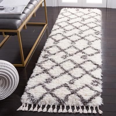 SAFAVIEH Handmade Flokati Melony Shag Solid Polyester Rug