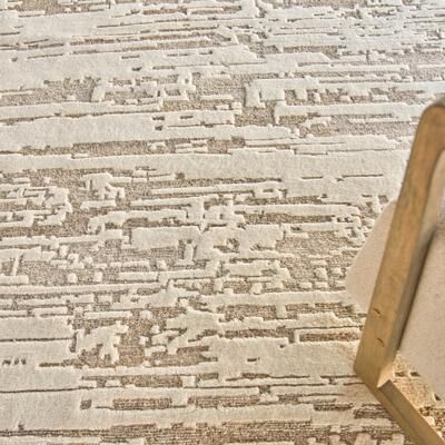 EXQUISITE RUGS Platinum Hand-knotted Wool/Nettle Beige Area Rug.