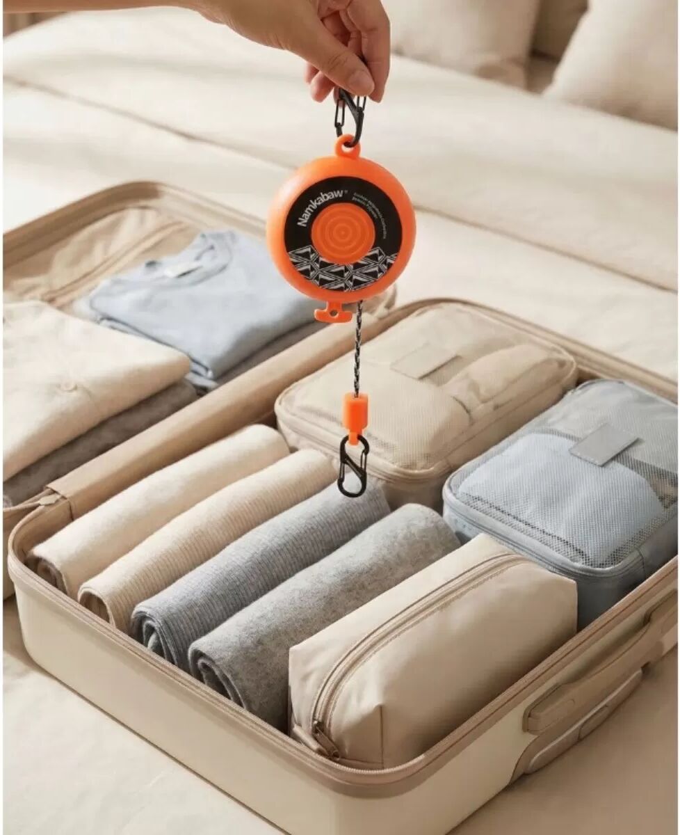 INF Outdoor kompakte versteckte einziehbare Wäscheleine Orange - 8m Handkurbel, bohrfrei, tragbar für Reise & Camping Orange